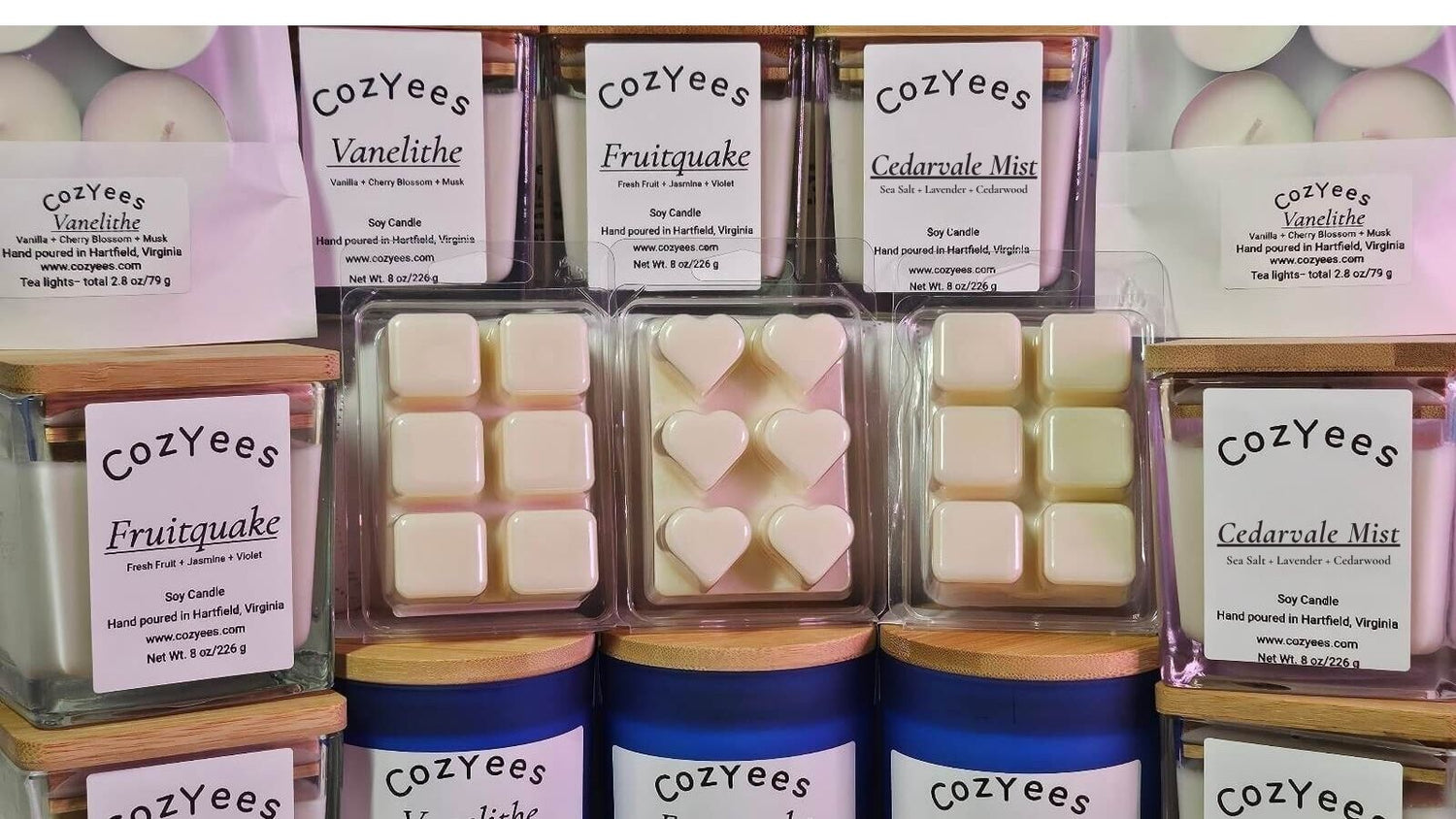 Cozyees wax melts in various scents displayed in packaging.