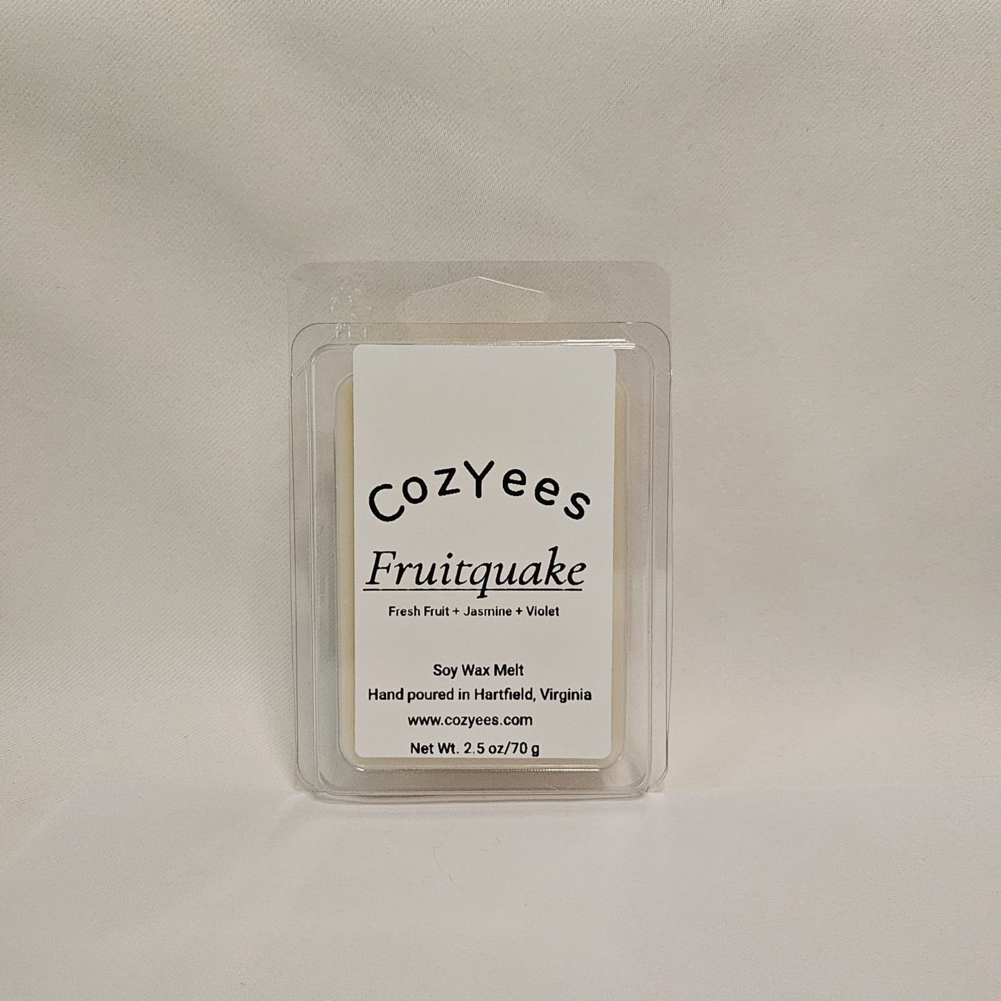 CozyYees Fruitquake scented wax melt packaging on a light gray background