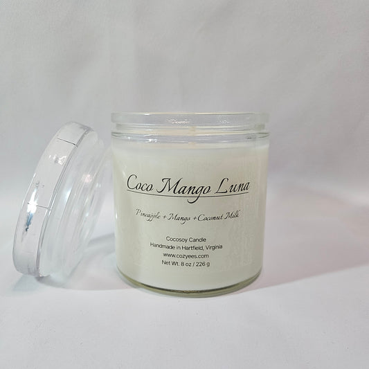 Candle jar with a label on a white background
