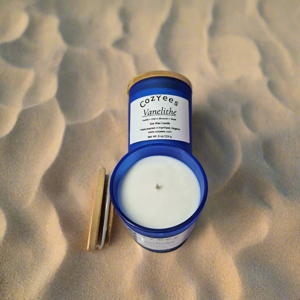 Cozyee's Vanillee candle with blue container on a white background