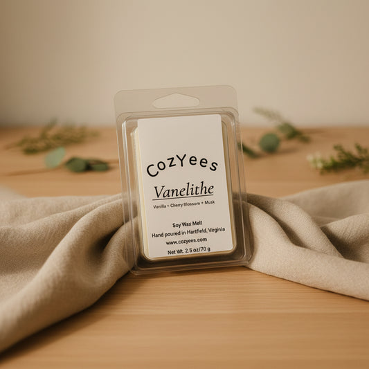 Cozyees Vanelithe soy wax melt packaging on a beige background