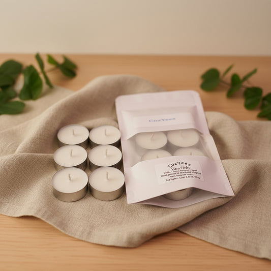 Cozyees tealight candles with packaging on a whitesurface