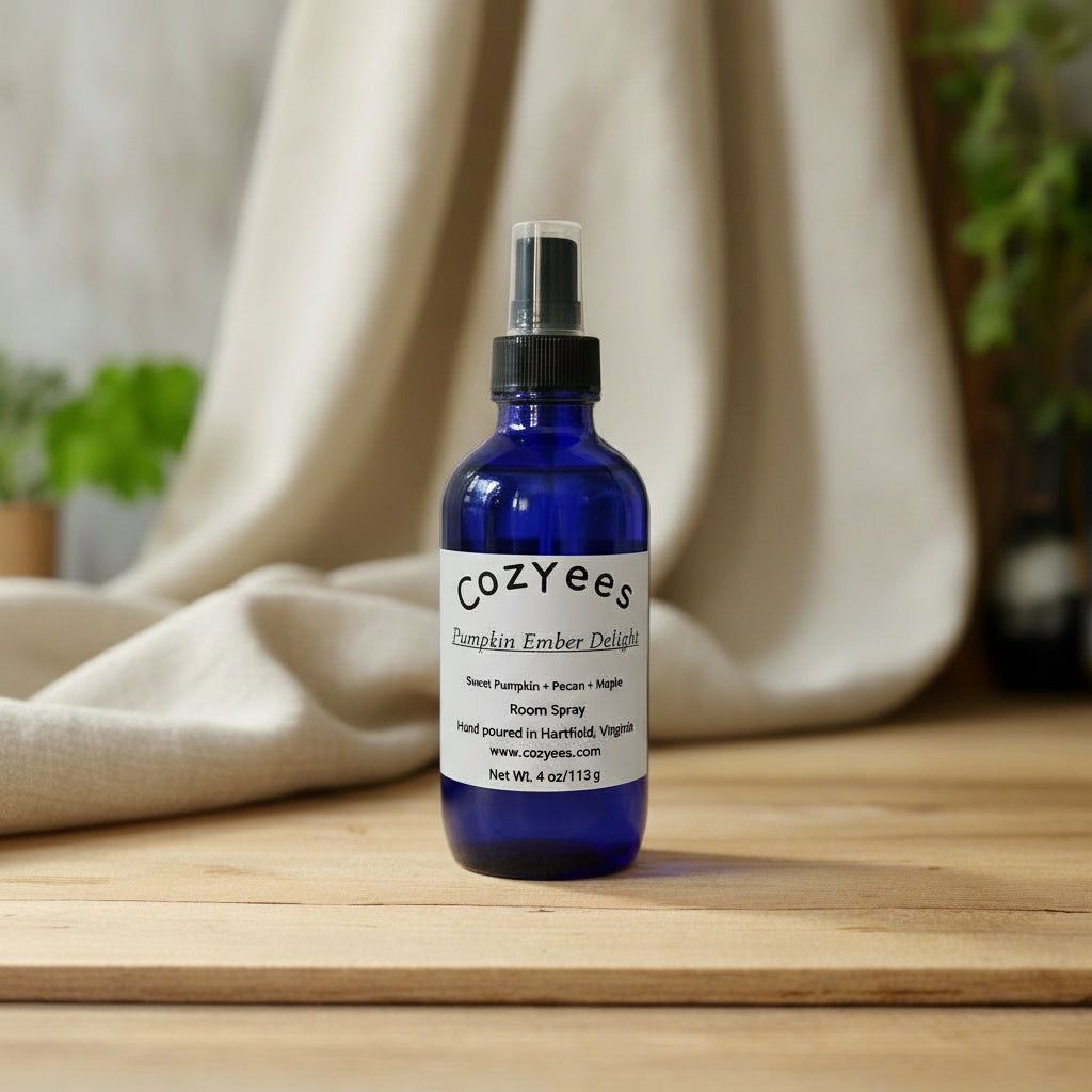 Blue Cozyees bottle on a textured white background