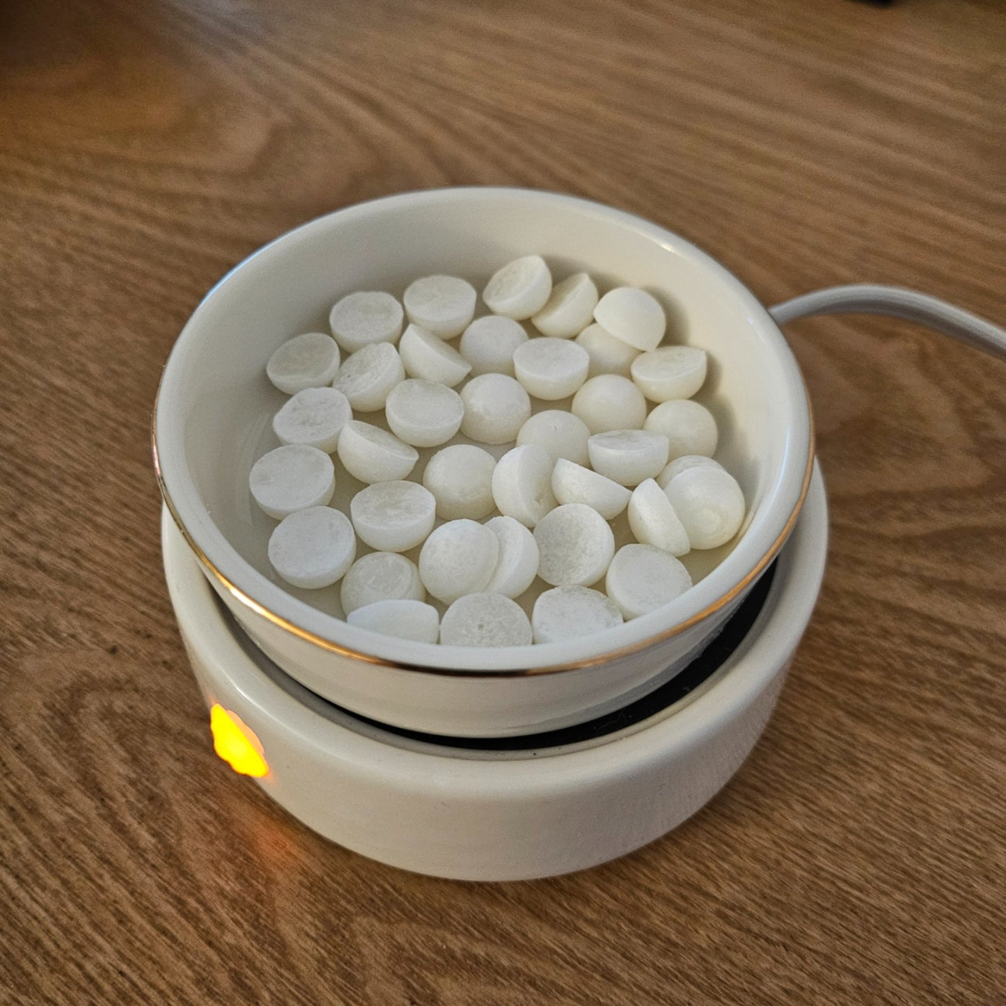 Cozyees Wax Melts Dots in a Wax Warmer