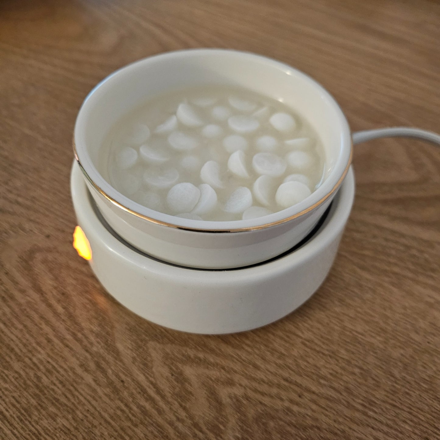 Cozyees Wax Melts Dots in a Wax Warmer