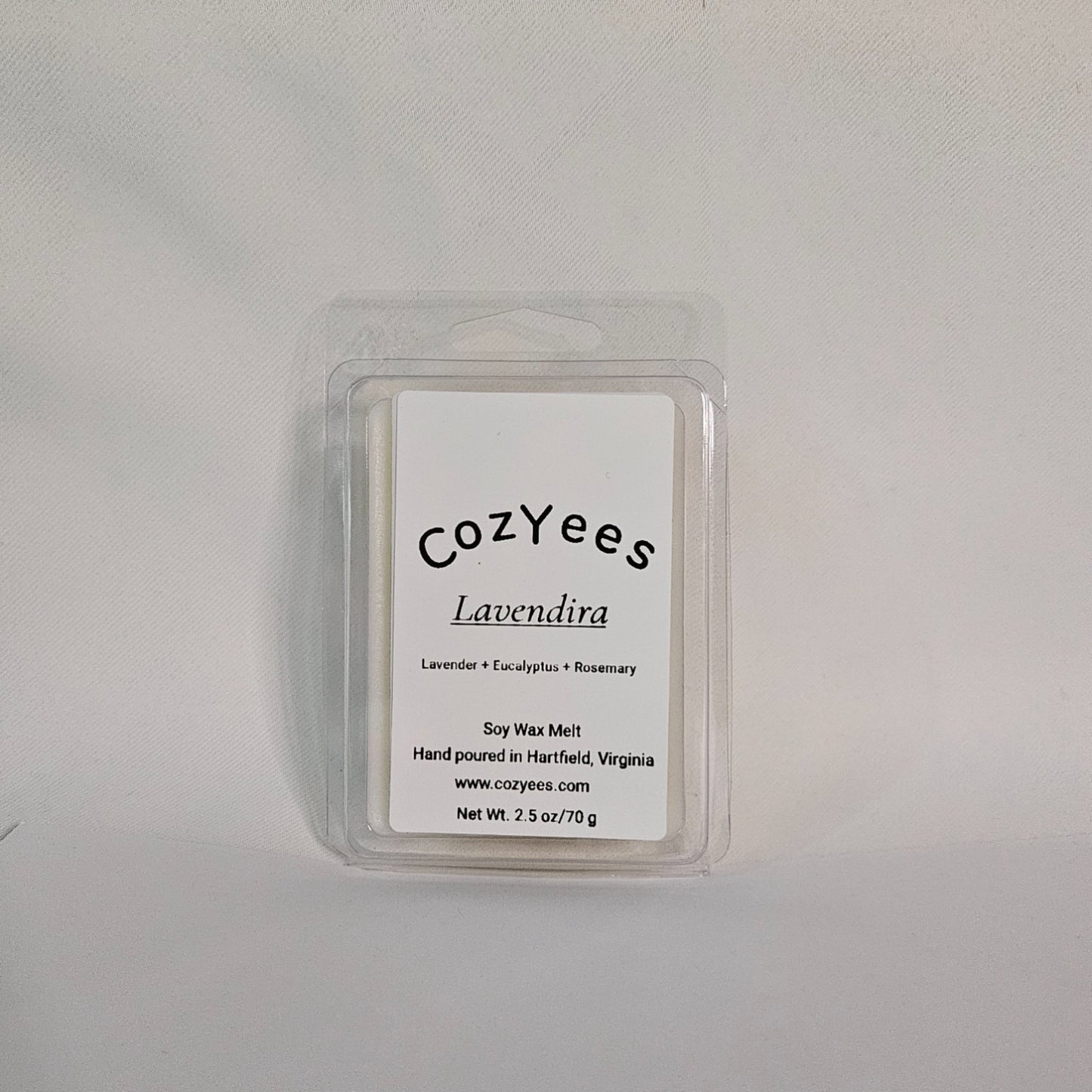 CozYees Lavendira wax melt packaging on a gray background