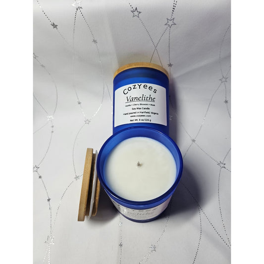 Cozyee's Vanillee candle with blue container on a white background