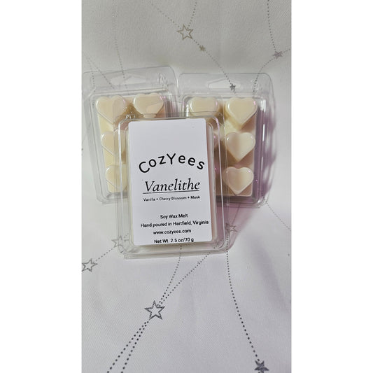 Pack of CozyYees Vanelithe wax melts on a light gray background