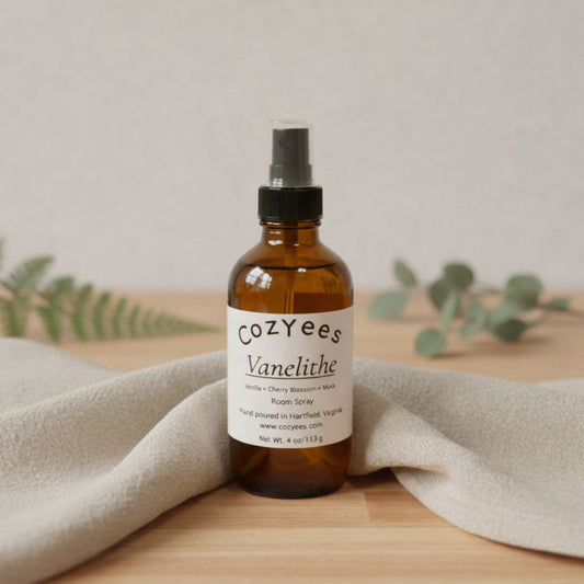 Brown glass bottle with a label on a wooden surface with a light background
